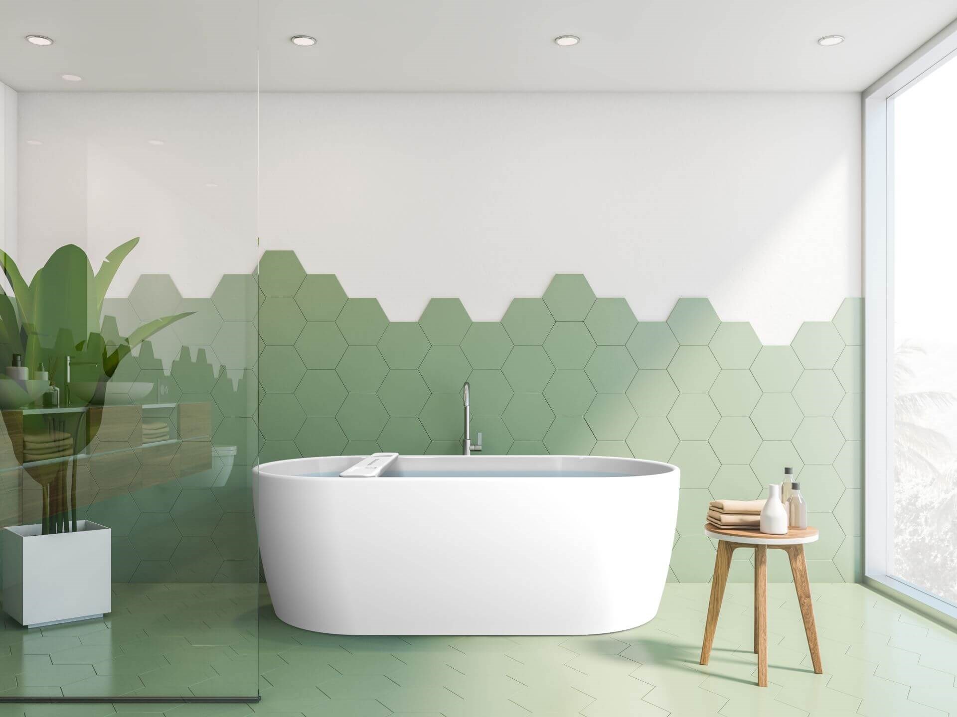 Miljøbilde frittstående badekar 170 cm. Badekar Embla fra Interform. Grønne fliser og detaljer i tre.